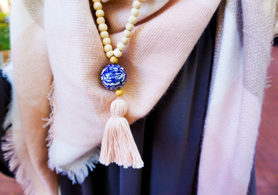 amy-from-i-believe-in-pink-wearing-swirling-honey-boutique-cold-shoulder-top-and-tiny-tassel-jewelry-and-uniqlo-leggings-11