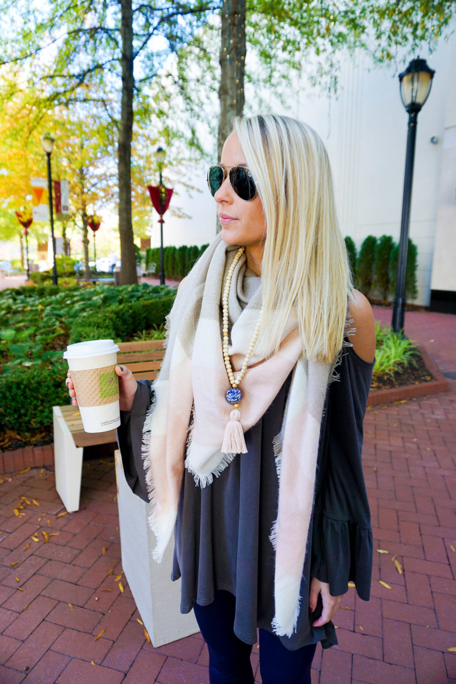 amy-from-i-believe-in-pink-wearing-swirling-honey-boutique-cold-shoulder-top-and-tiny-tassel-jewelry-and-uniqlo-leggings-8