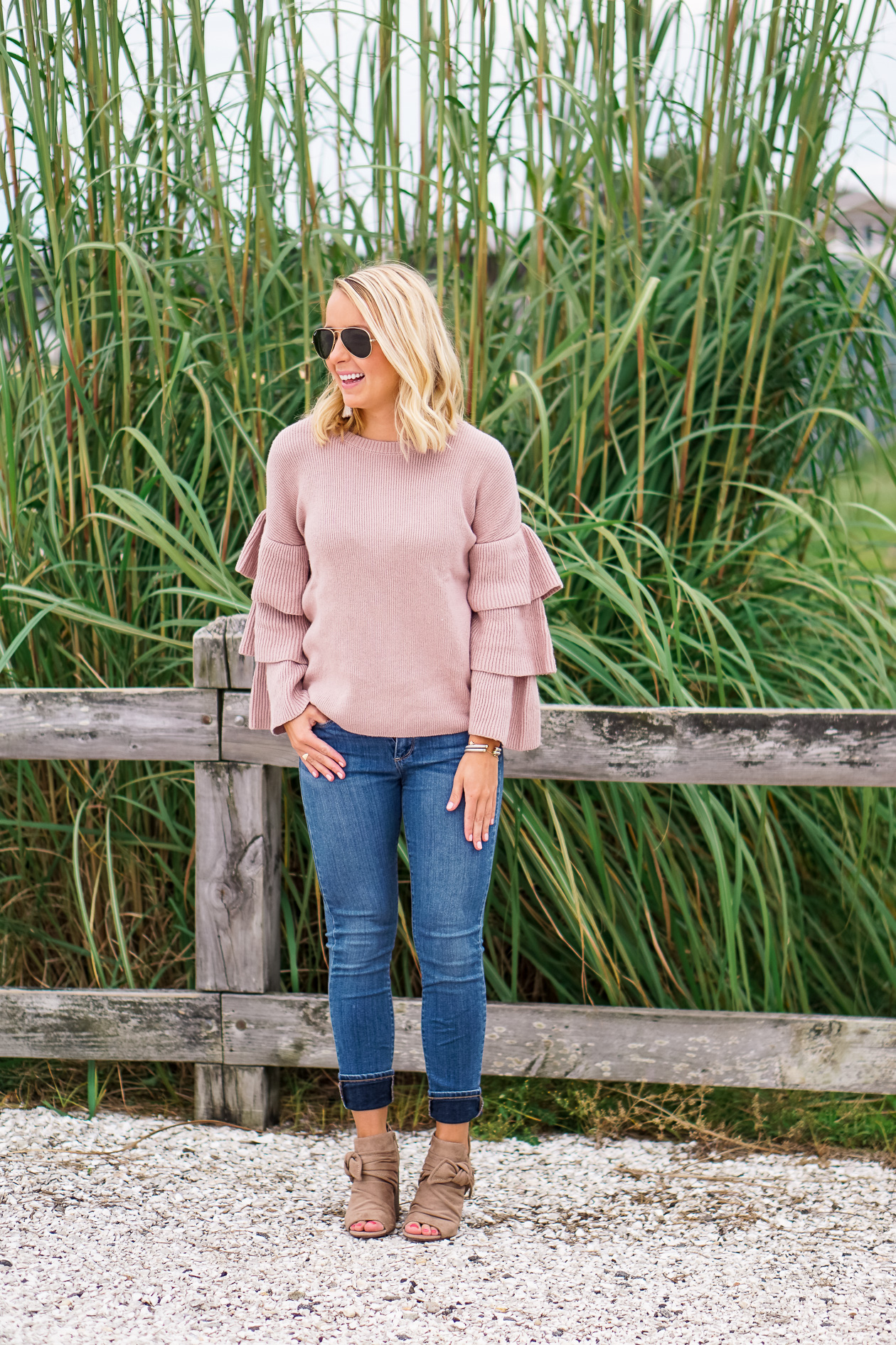 Blus ruffle Nordstrom sweater and bow booties with Lisi Lerch tassel earrings