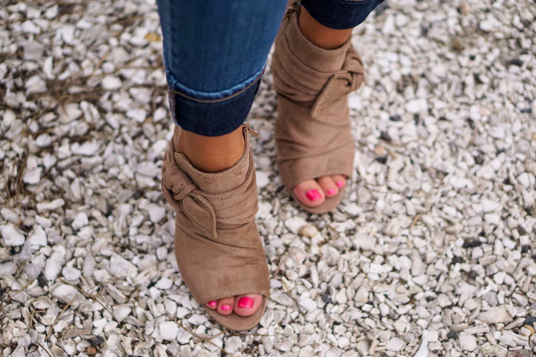 Blush ruffle Nordstrom sweater and bow booties with Lisi Lerch tassel earrings