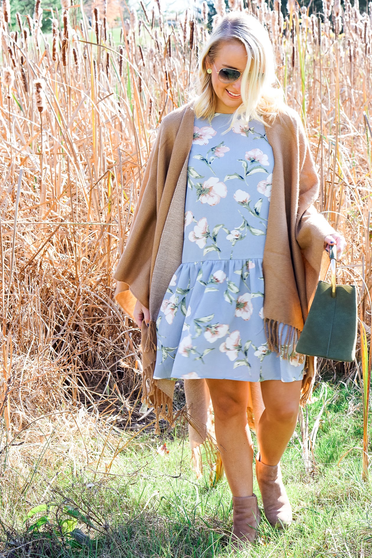Camel tassel poncho and blue floral dress for Thanksgiving outfit