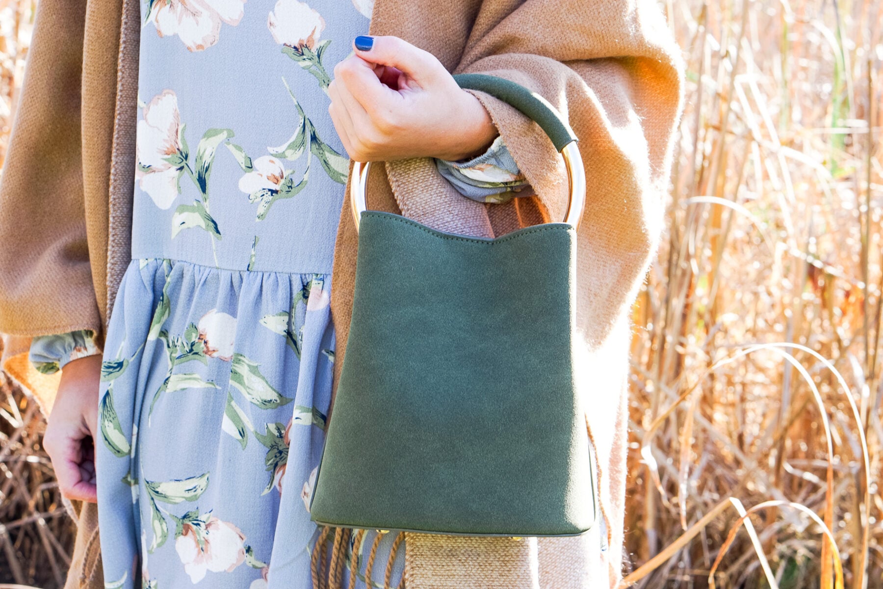 Camel tassel poncho and blue floral dress for Thanksgiving outfit