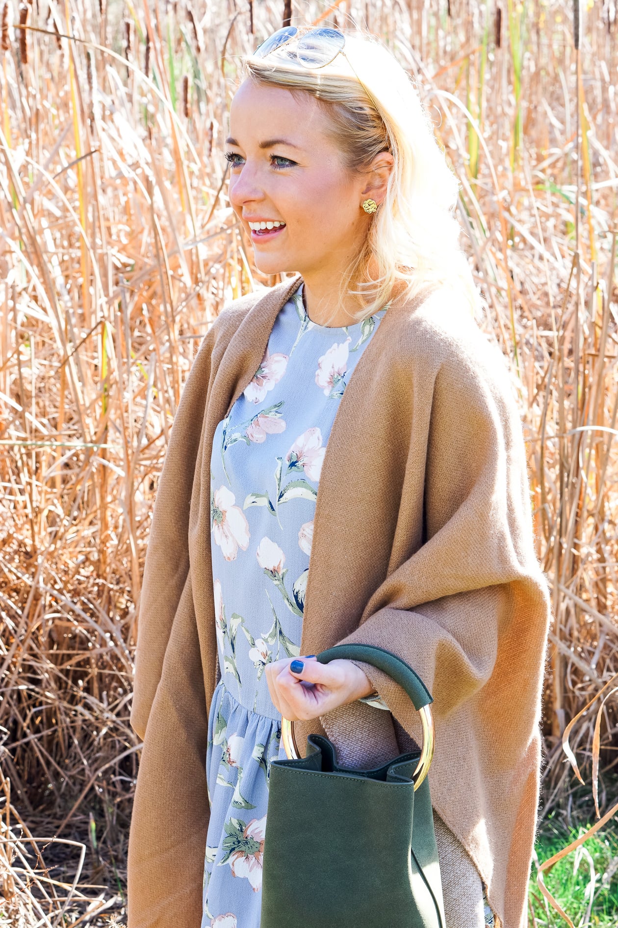 Camel tassel poncho and blue floral dress for Thanksgiving outfit