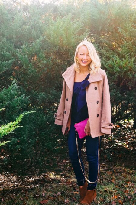Navy J Crew bow top and pink cow hide clutch